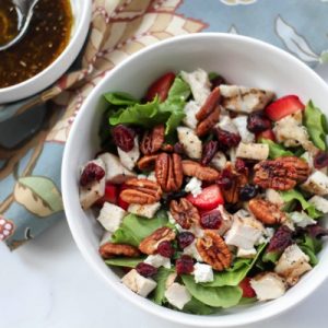 grilled chicken salad with maple-roasted pecans and strawberries