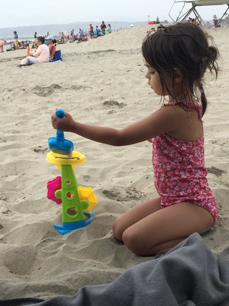 Liv playing in the sand