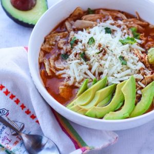 Chicken tortilla soup in the Instant Pot only using 6 ingredients. Gluten-free, packed with protein, and the whole family will love it. Fitnessista.com